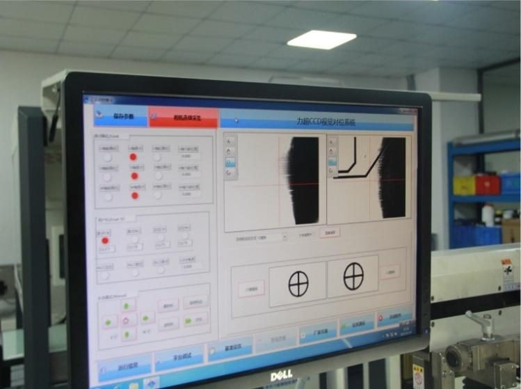 CCD alignment screen: two cameras locate the marks and the system corrects position before printing.